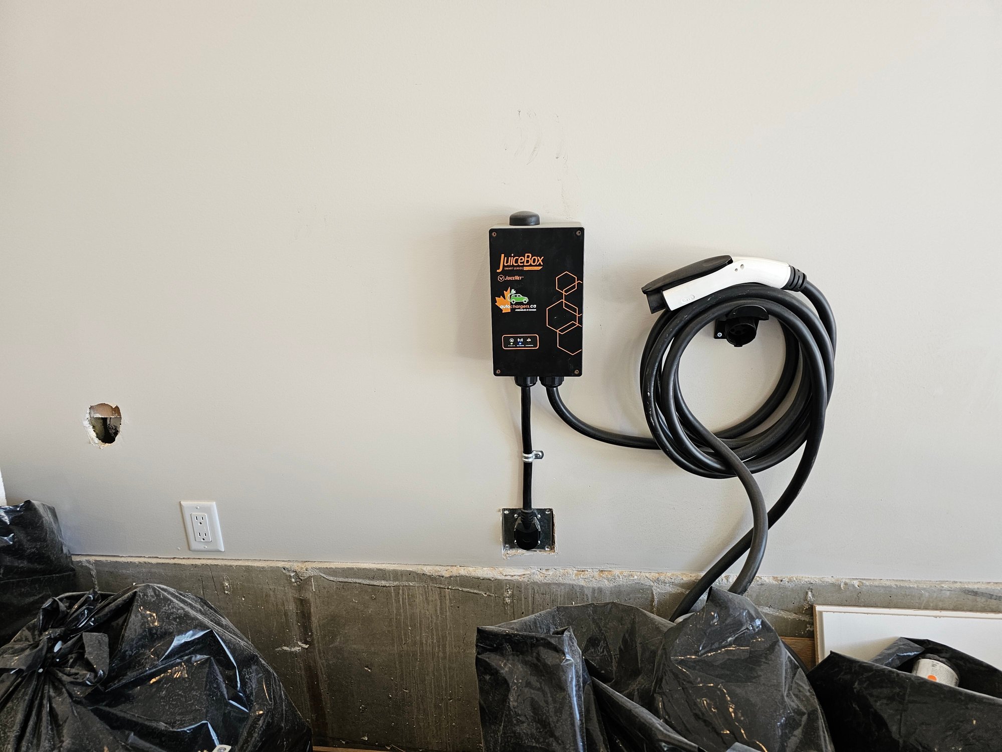 EV charger installed in garage of home