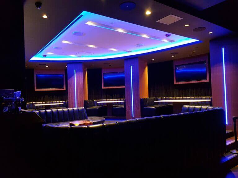 Blue-lit commercial space